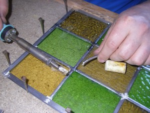 Lead joints being soldered